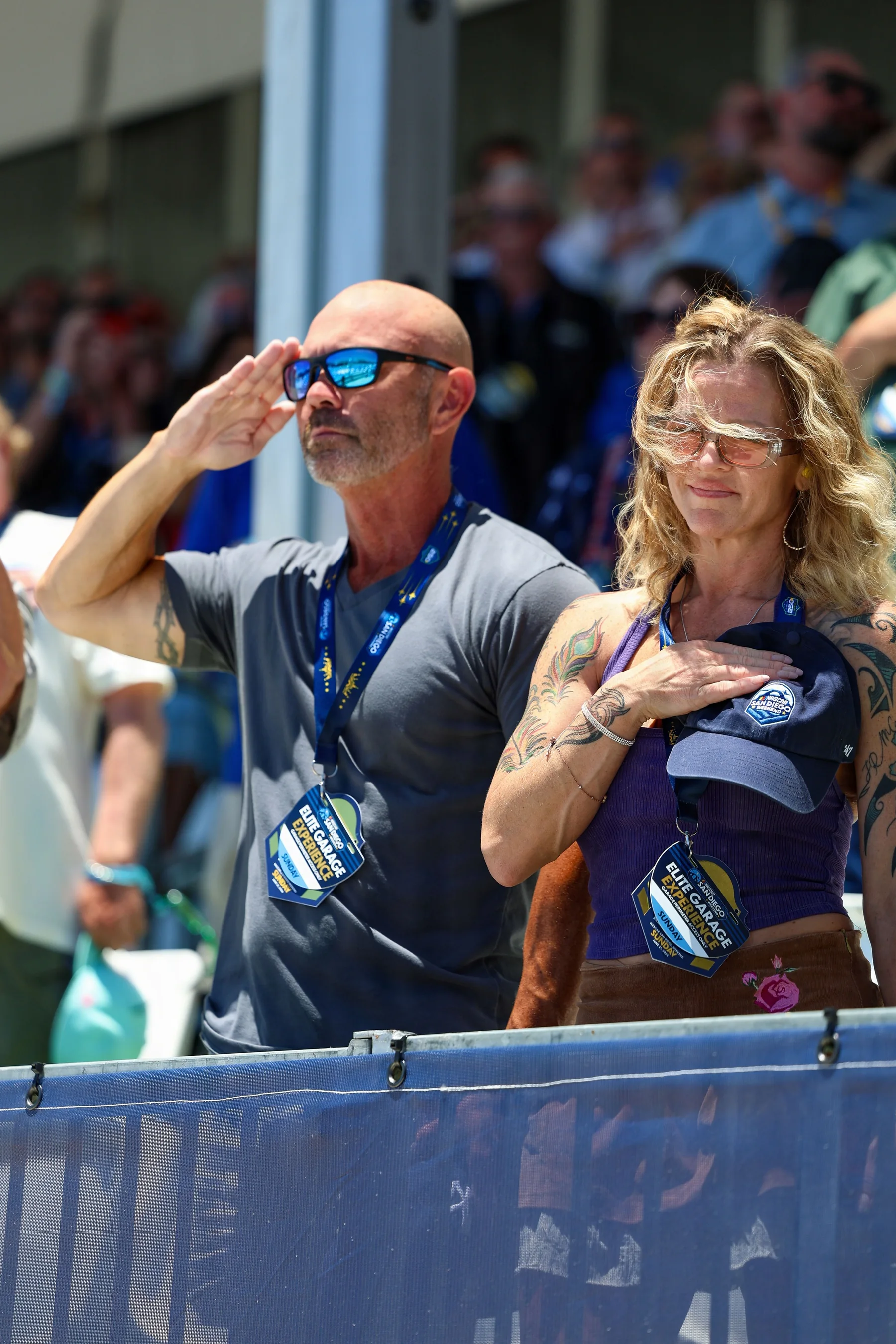 NASCAR San Diego spectators saluting during the pre-race anthem at Naval Base Coronado in 2026